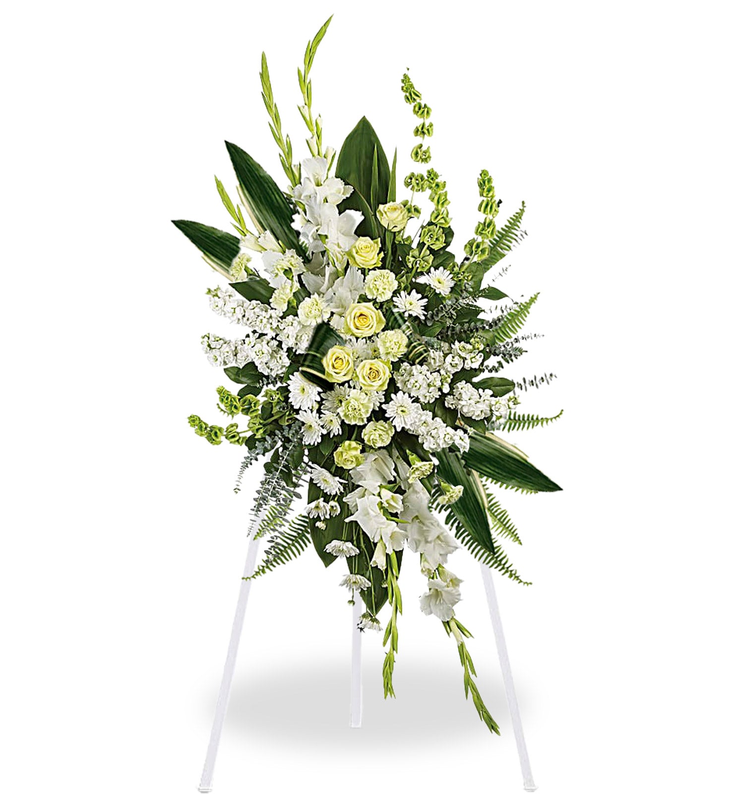 Standing sympathy spray arrangement featuring white lilies, white and yellow roses, snapdragons, carnations, and lush greenery displayed on an easel against a white background.